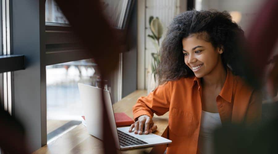 Concept photo of a woman working at a computer.