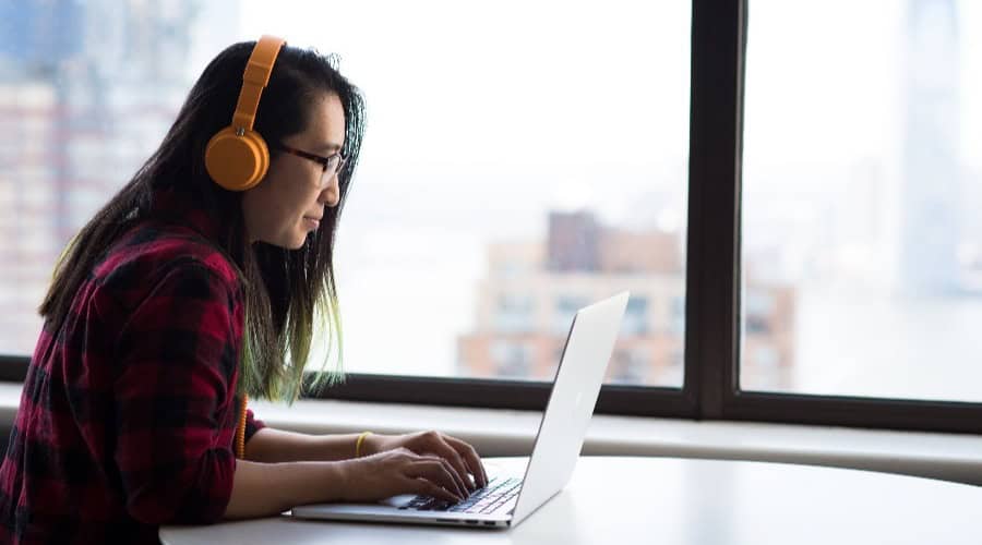 Concept photo of a woman working at a computer.