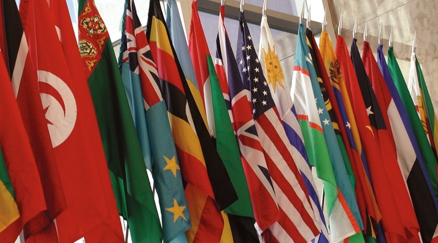 Picture of world flags in the Department of State lobby.