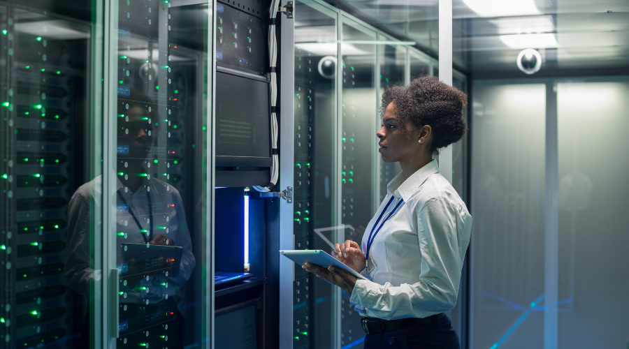 Concept photo of a woman looking at mainframes.
